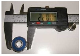 A Vernier measuring the outside diameter of a ball bearing
